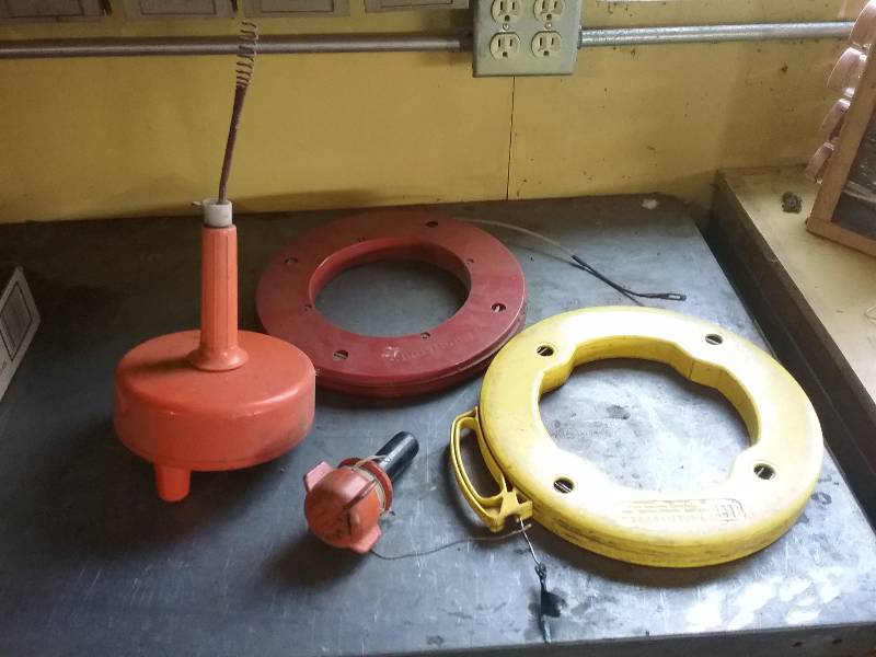 lot 113 image: Lot - 100FT Fish Tapes, Sewer Snake, Etc