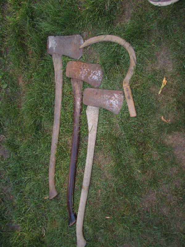 lot 588 image: THREE AXES AND HAND SCYTHE
