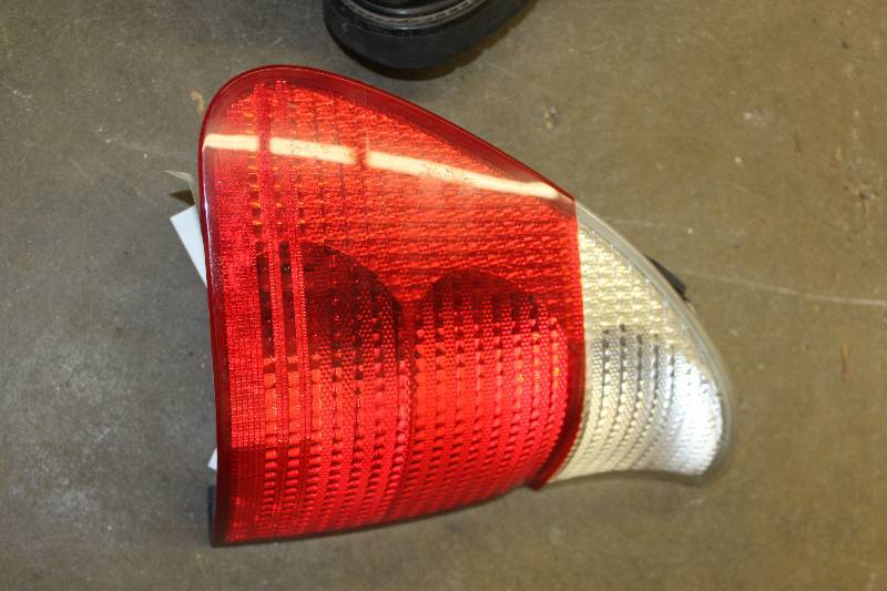 lot 199 image: 2003 BMW X5 Drivers Side Tail Light
