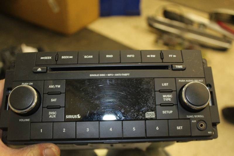 lot 215 image: 2014 Jeep Wrangler CD Player