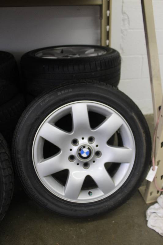 lot 11 image: BMW 16in. Wheel w Continental ContiTouringContact P20555R16 Tire