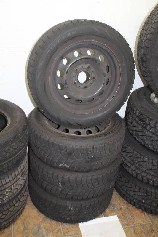 lot 23 image: Lot of (4) 5-Lug 15in. Steel Wheels w Blizzak P20560R15 Snow Tires