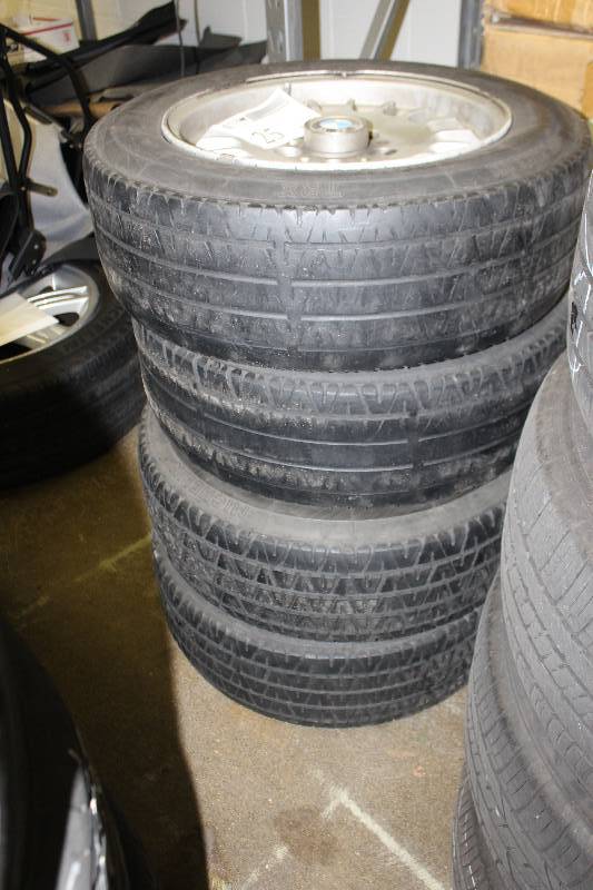 lot 25 image: Lot of (4) BMW  Wheels w Michelin TRX P20060VR 390 Tires
