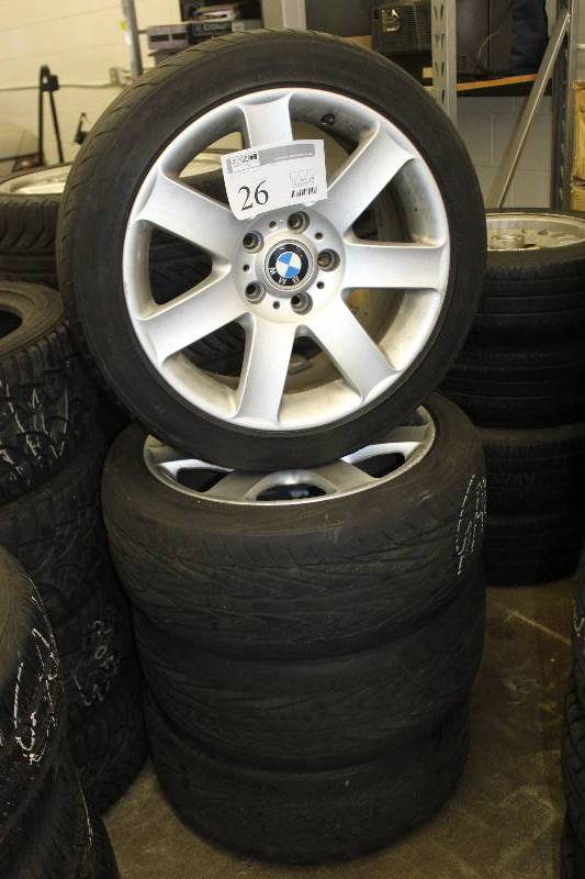 lot 26 image: Lot of (4) BMW 17in. Wheels w Toyo P22545ZR17 Tires