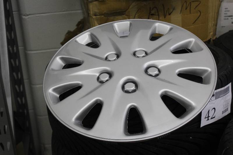 lot 51 image: Lot of (4) 5-Lug Hub Caps