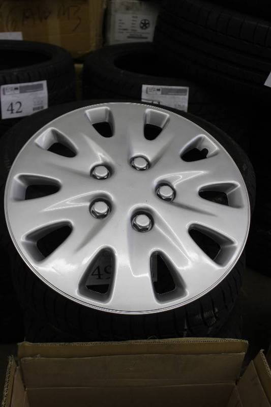 lot 52 image: Lot of (4) 5-Lug Hub Caps