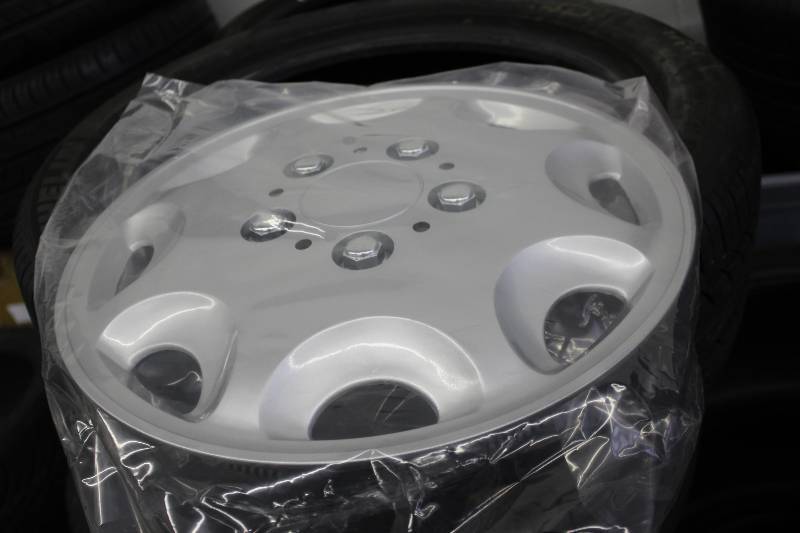 lot 53 image: Lot of (4) 5-Lug Hub Caps