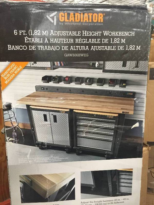 lot 9 image: Gladiator 6 ft. Hardwood Top Adjustable Height Workbench in Hammered Granite open box never used