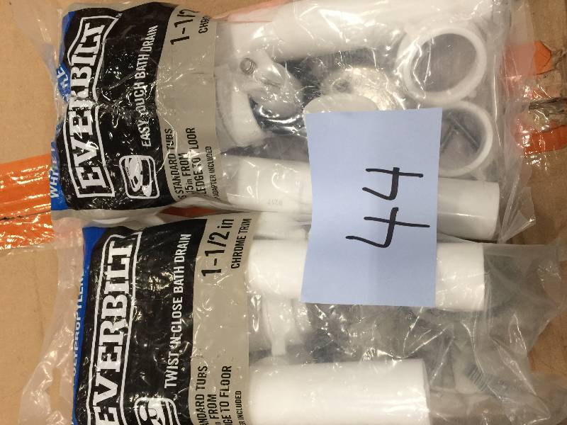 lot 44 image: Set of 2  Everbilt Twist and Close 1-12 in. White Poly Pipe Bath Drain in Chrome New