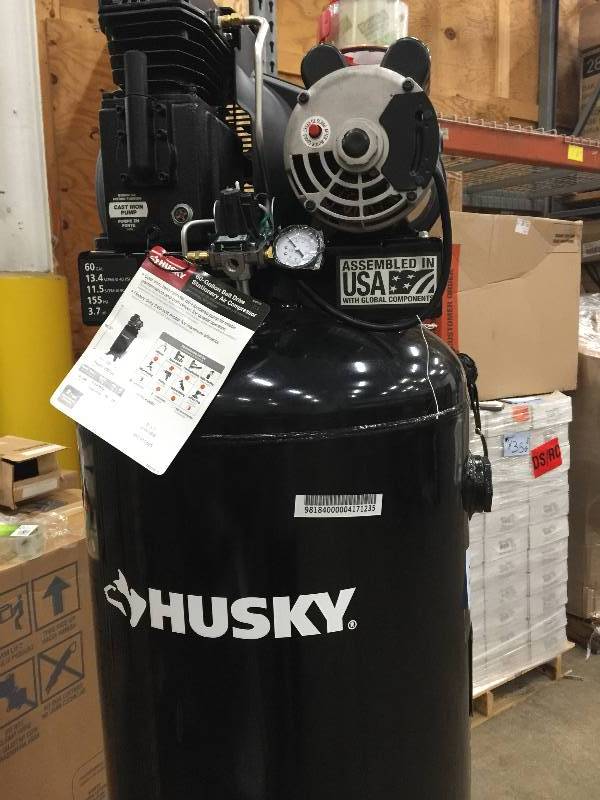 lot 55 image: Husky 60 Gal. Stationary Electric Air Compressor appears in like New conditions
