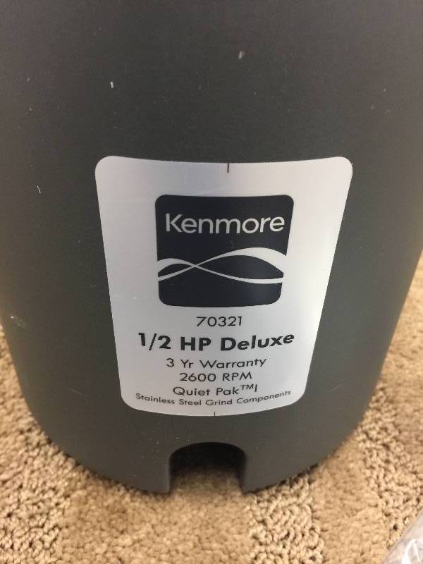 lot 71 image: Kenmore 70321 12 Horsepower Deluxe Garbage Disposer - Dark Gray