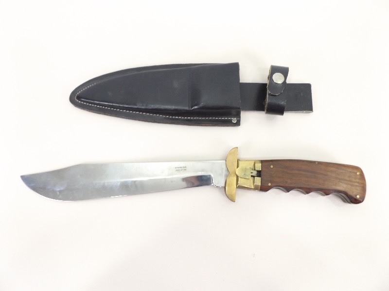 lot 24 image: VERY Large Folding Knife in Leather Sheath