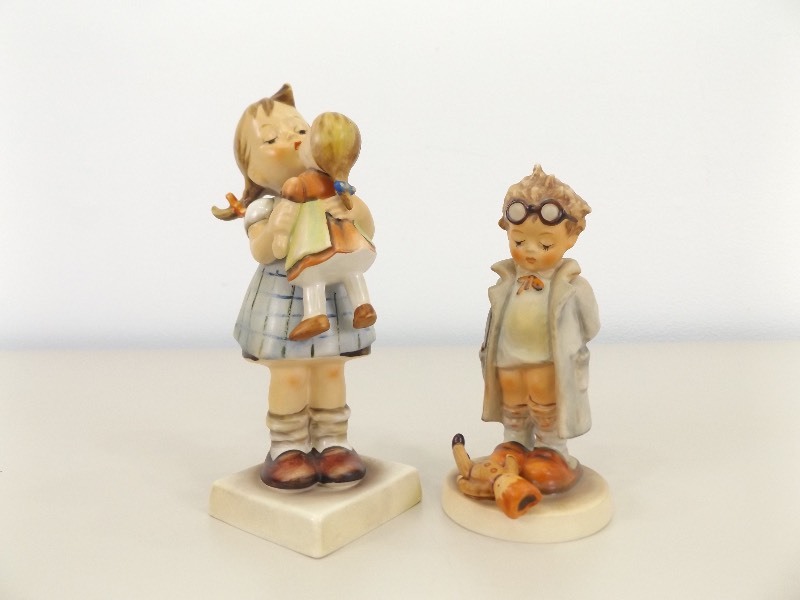 lot 32 image: 2 Vintage Goebel Hummel Figurines #s 127 Doctor and 311 Kiss Me