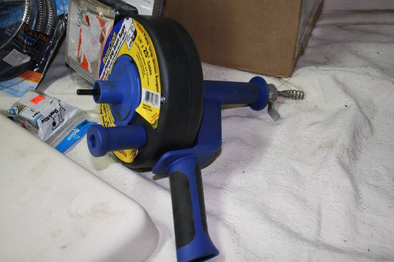 Toilet Tank and Assorted Plumbing