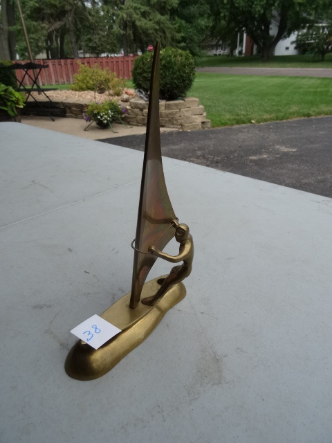 lot 38 image: Brass Surfer On Surf Board Figurine