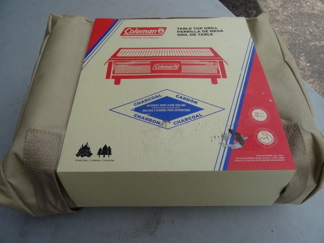 lot 44 image: Coleman Portable Camping Charcoal Grill.