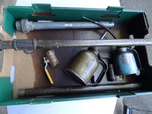 lot 120 image: 2 Oil Cans And Misc Pipe