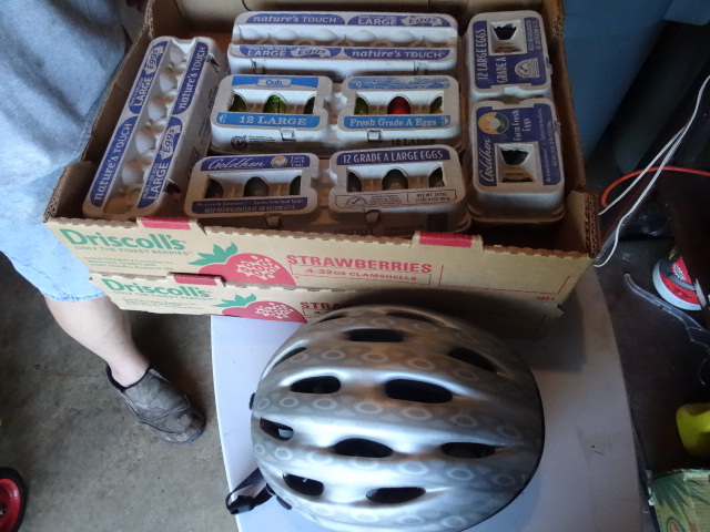 lot 189 image: Bicycle Helmet And 10 Dozen Used Golf Balls