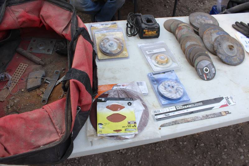 lot 106 image: Klutch 4.5in. Zirconia Flap Discs, DeWalt Battery Charger, Misc 5,7in. Discs, Hacksaw Blades, And More