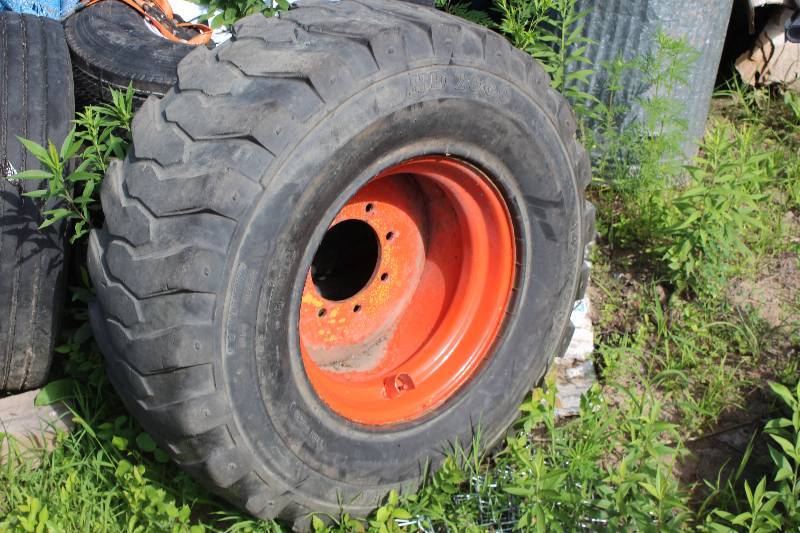 lot 9 image: Skid Loader Spare Tire,