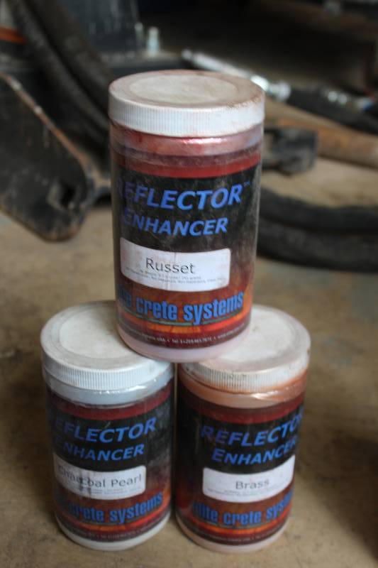 lot 150 image: Lot of (3) Bottles Concrete Reflector Enhanser - Charcoal Pearl, Russet, Brass