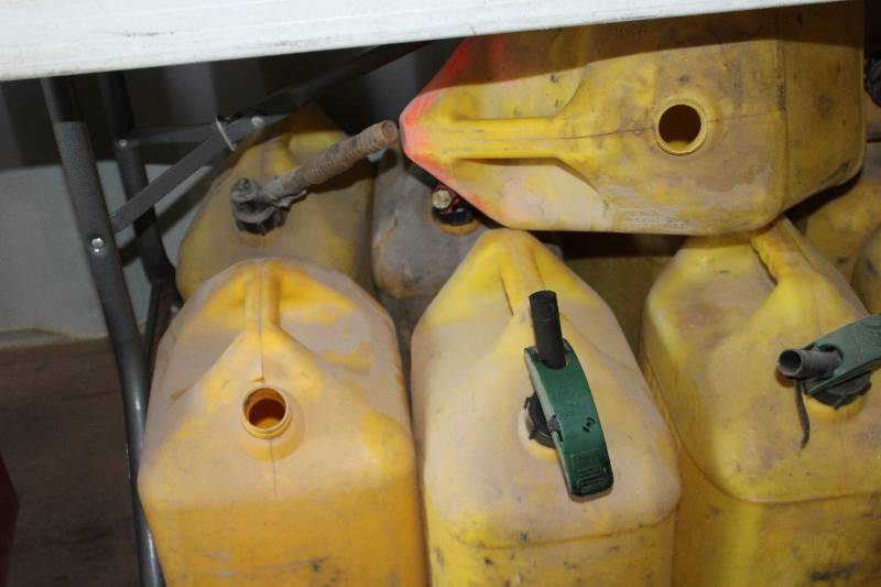 lot 243 image: Lot of (9) Yellow Plastic diesel Cans