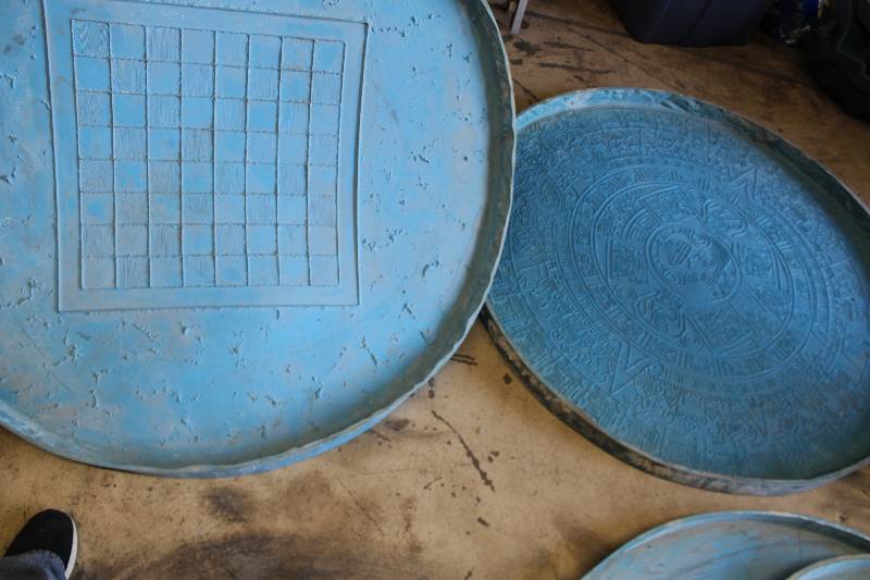 lot 262 image: Lot of (8) Concrete Molds - 2-48in. Checkerboard & Aztec Table, 3-Long, 3-Short