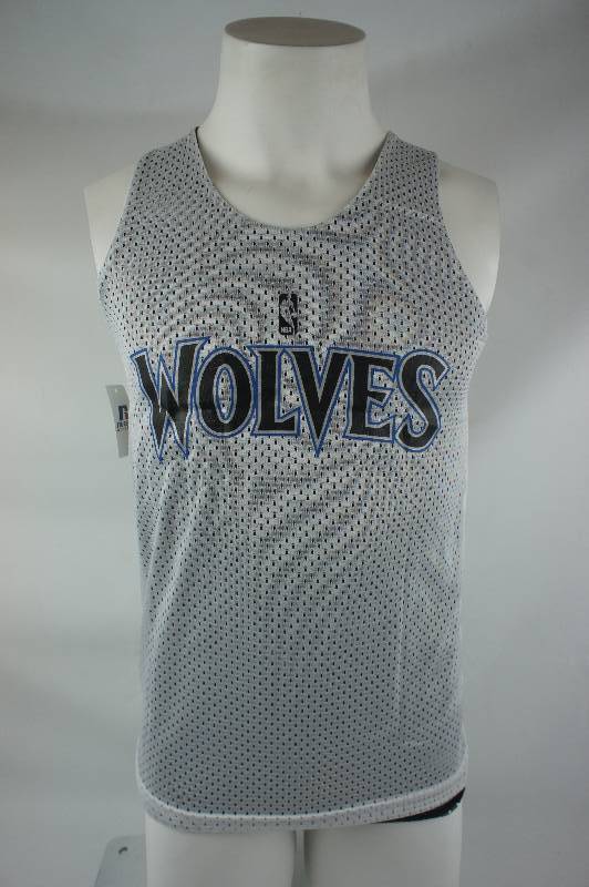 lot 110 image: New Minnesota Timberwolves - Russell Athletic Black and White Reversable Practice Jersey - Size Youth Medium