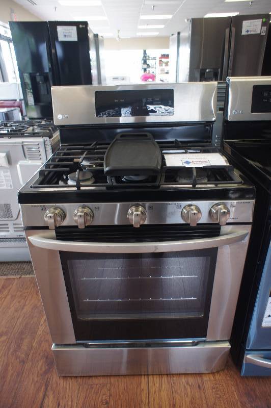 lot 10 image: New - Scratch & Dent LG Model # (LRG3061ST) - Gas Range - Freestanding - 5.4 cu ft - Stainless Steel - Tested Works - MSRP $ 1199.99