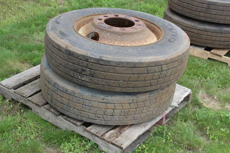 lot 33 image: Lot of (2) Toyo 28575R24.5 Truck Tires w 10-Lug Wheels