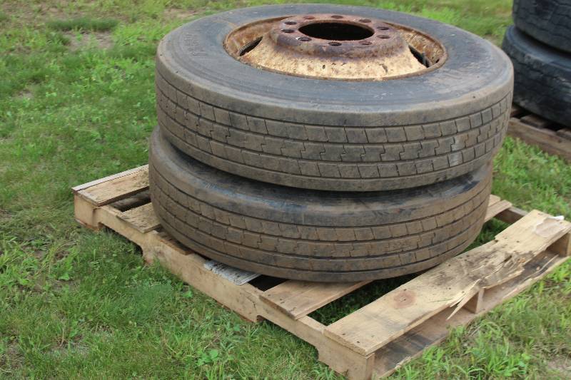 lot 34 image: Lot of (2) Firestone 28575R24.5 Truck Tires w 10-Lug Wheels