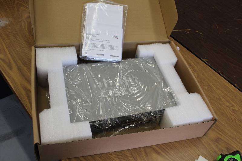 lot 12 image: Cisco Systems Small Business 24-Port 10100 PoE Managed Switch
