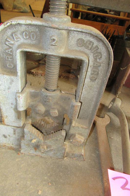 lot 34 image: Vintage Pipe Vise  Pipe Cutter and 2 wrenches