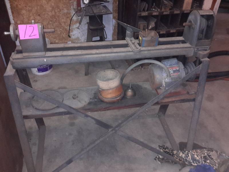 lot 12 image: Wood Turning Lathe.. Sears and Roebuck.. Includes a box of knives