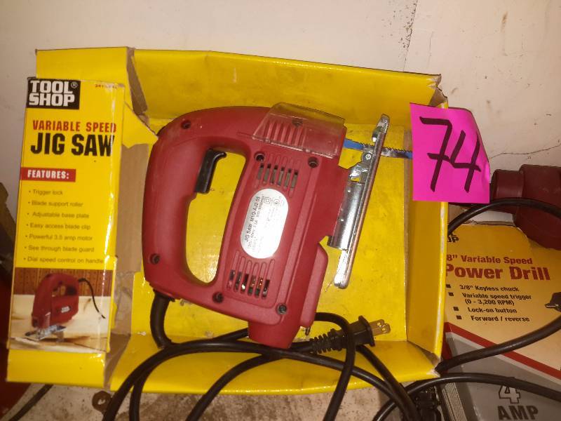 lot 74 image: Tools shop drill and Jig Saw..  Coleman Cordless Drill and charger, but battery has been taped on. .Drill works, but not sure for how long in this condition.  Charger works