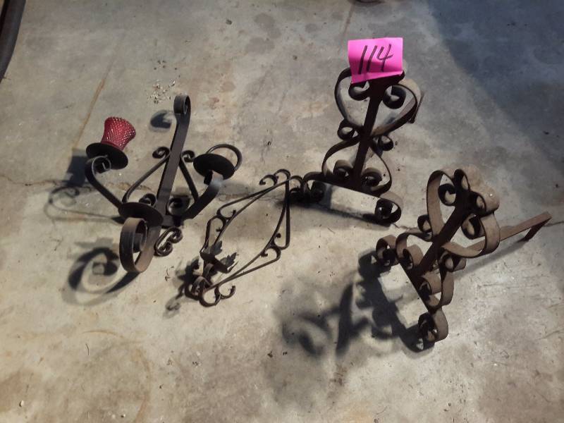 lot 114 image: Pair of steel Andirons and sconse candle holders