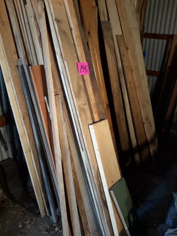 lot 145 image: Lot of rough cut wood.