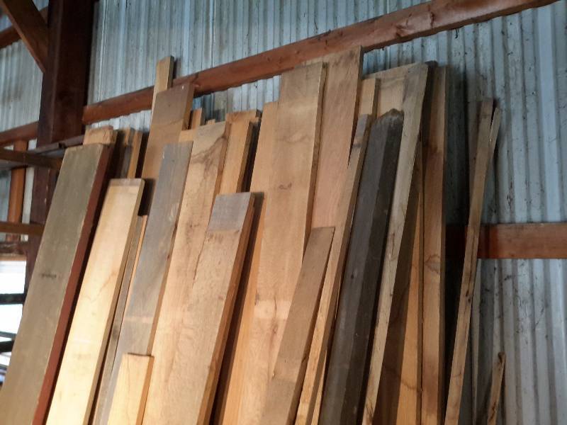 lot 163 image: Lot of misc. sizes lengths of rough cut wood