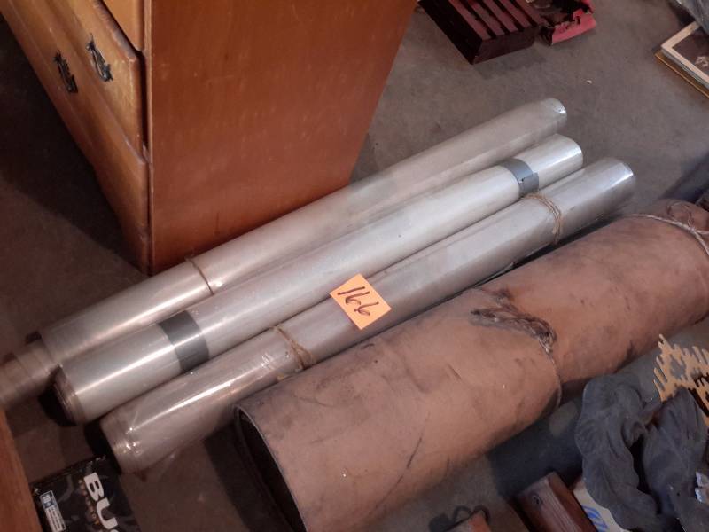 lot 166 image: 3 rolls of heavy plastic sheeting and roll of foam