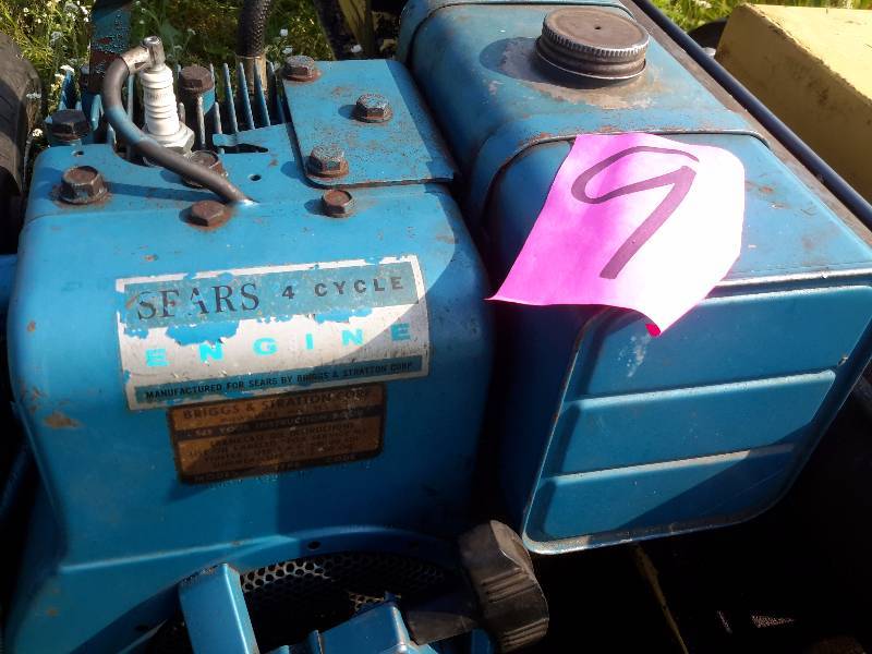 lot 9 image: Wood splitter  Sears 4 cycle Briggs and Stratton Engine.