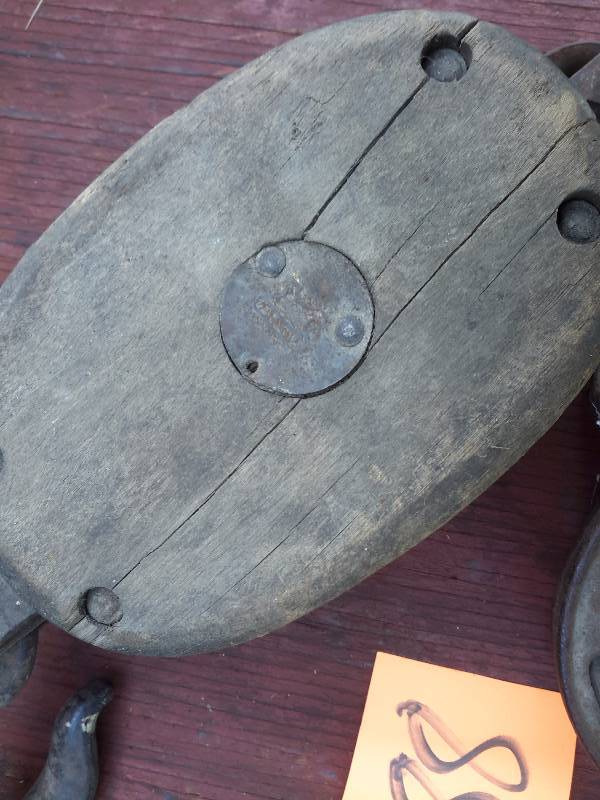 lot 188 image: 2 vintage pulleys