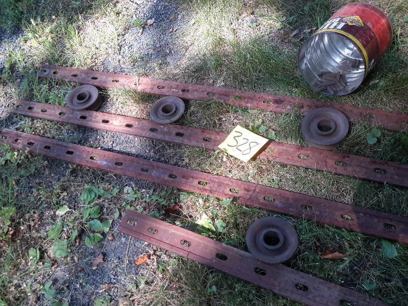 lot 328 image: track for manure bucket plus wheels and shims.. Please inspect