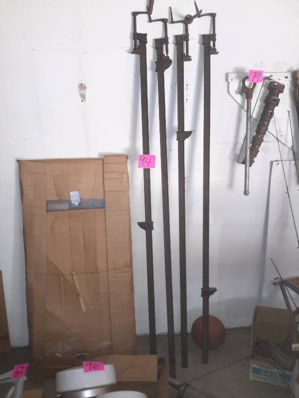 lot 94 image: 4 LONG Clamps..  think they are about 48 in