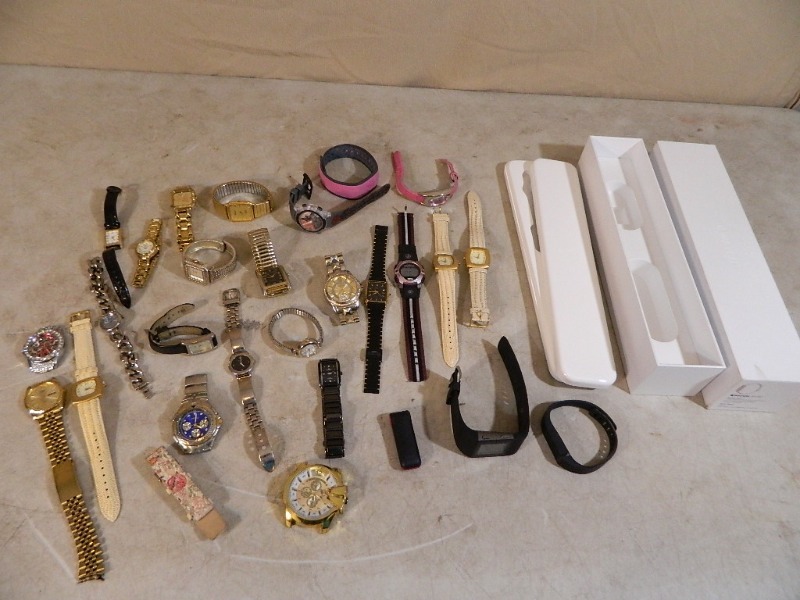 lot 21 image: Fit Bit, Watches, and More