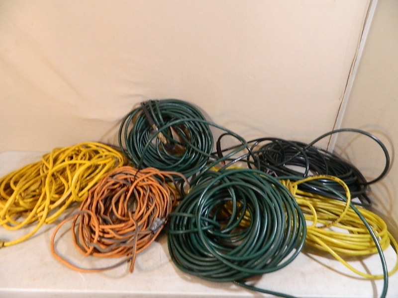 lot 83 image: Air Hose and Extension Cords