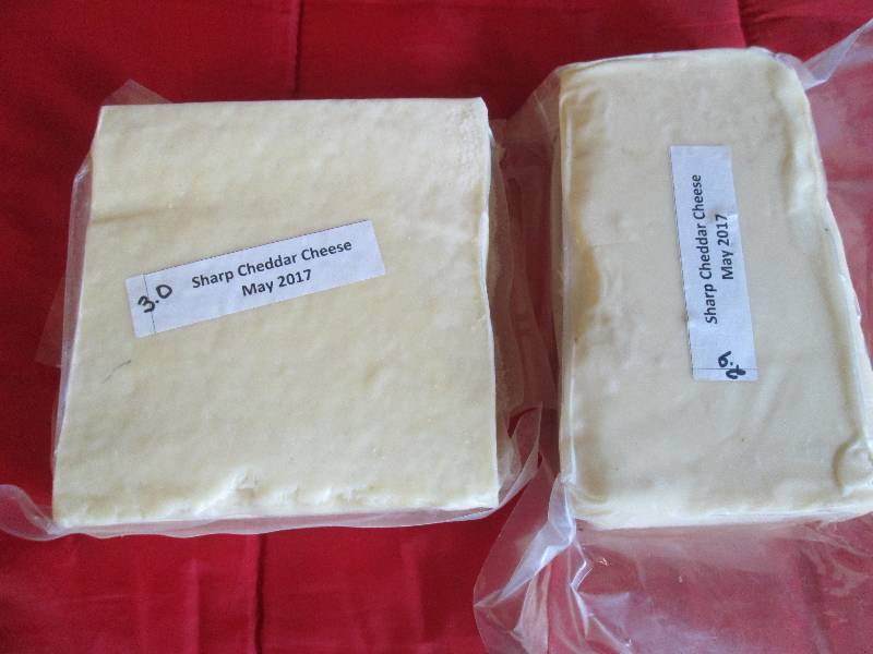 lot 8 image: 5.9 lb.Chunk Sharp Cheddar Cheese P...