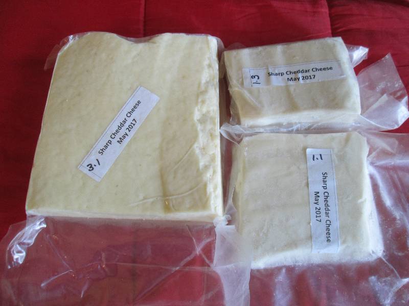 lot 15 image: 5.5 lb.Chunk Sharp Cheddar Cheese P...