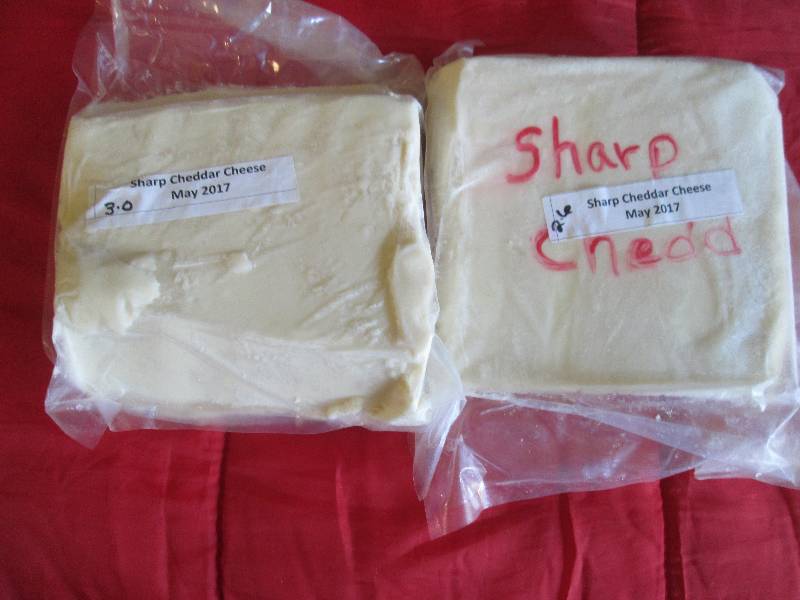 lot 24 image: 5.6 lb.Chunk Sharp Cheddar Cheese P...
