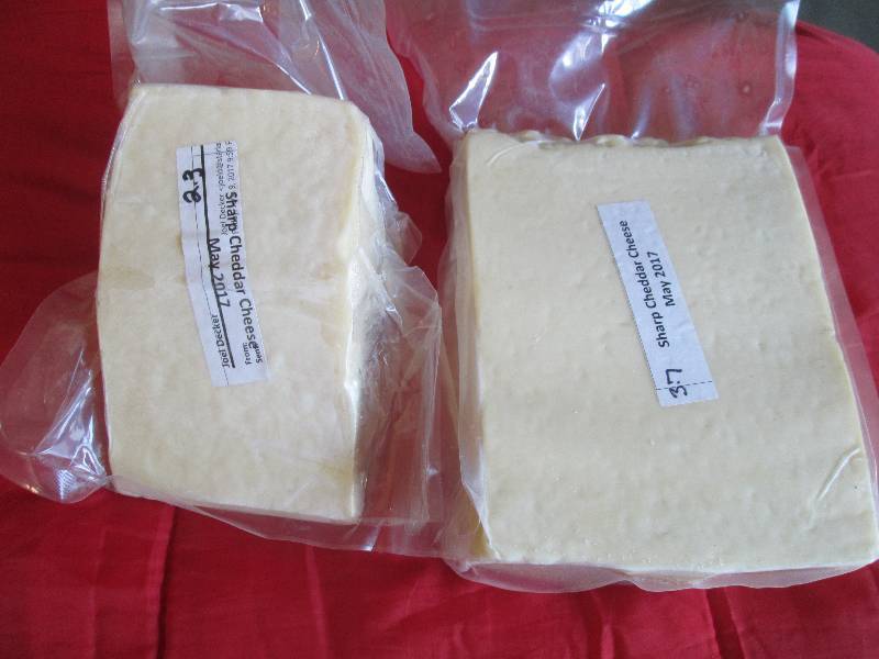 lot 28 image: 6.0 lb.Chunk Sharp Cheddar Cheese P...