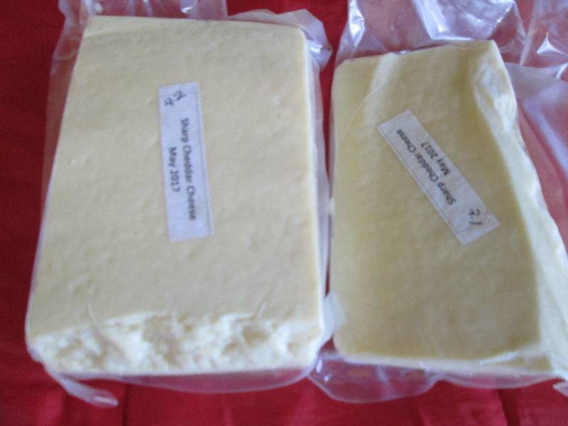 lot 31 image: 6.3 lb.Chunk Sharp Cheddar Cheese P...